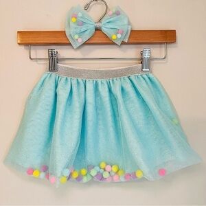 Little Me Turquoise Skirt with Rainbow Poms Silver Waistband & Matching Bow set
